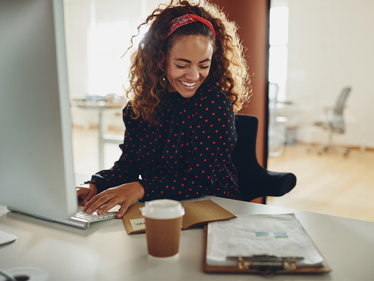 young woman working at a desk