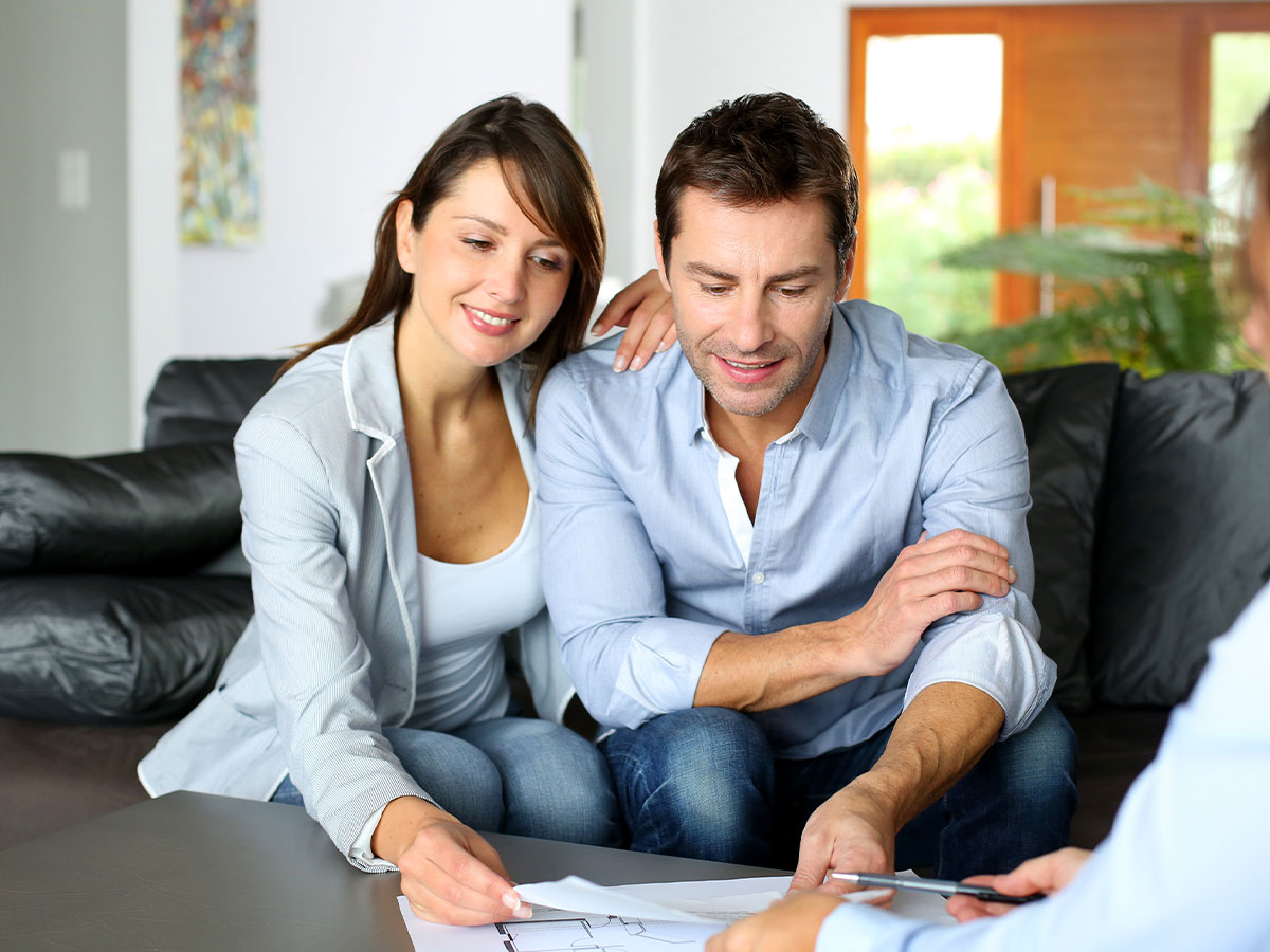 two renters looking at paperwork