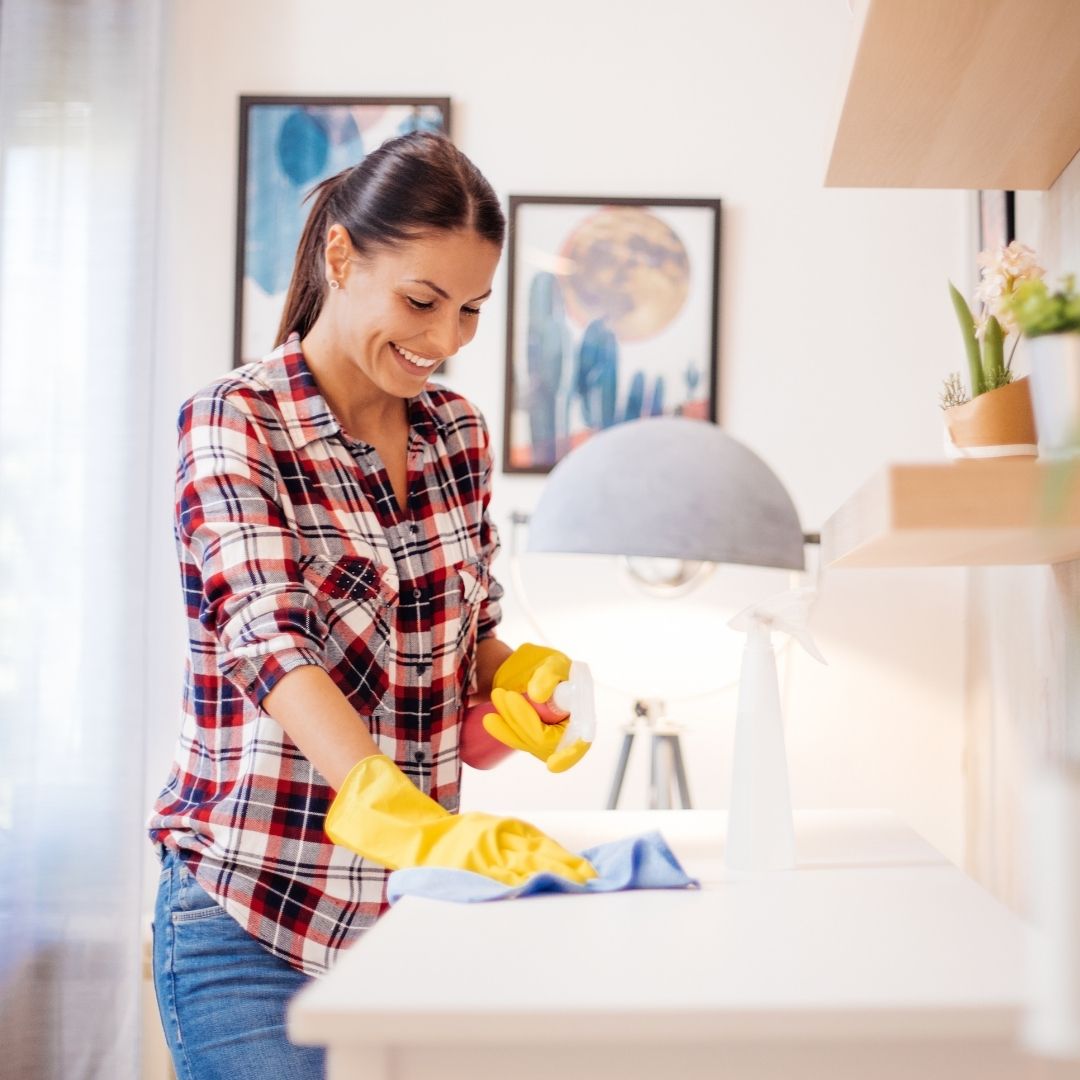 woman cleaning counter