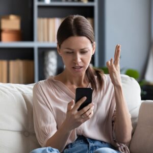 woman frustrated on phone