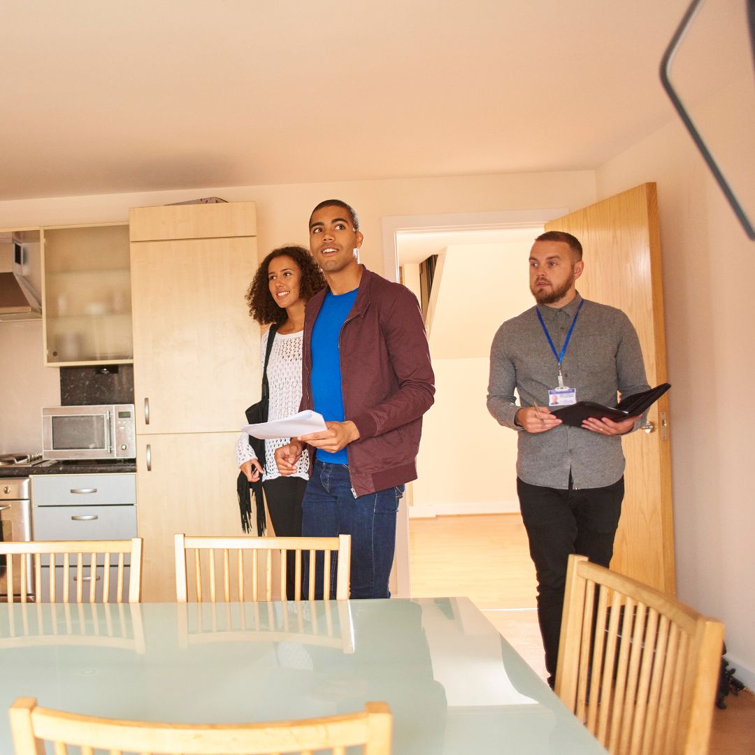 couple looking at a rental house